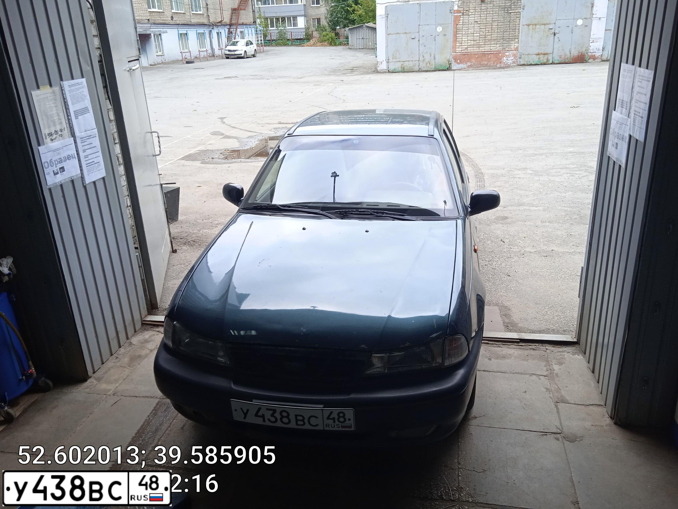 Фото автомобиля DAEWOO NEXIA, 2003 — госномер О070РУ97. Цвет: Темно-зеленый