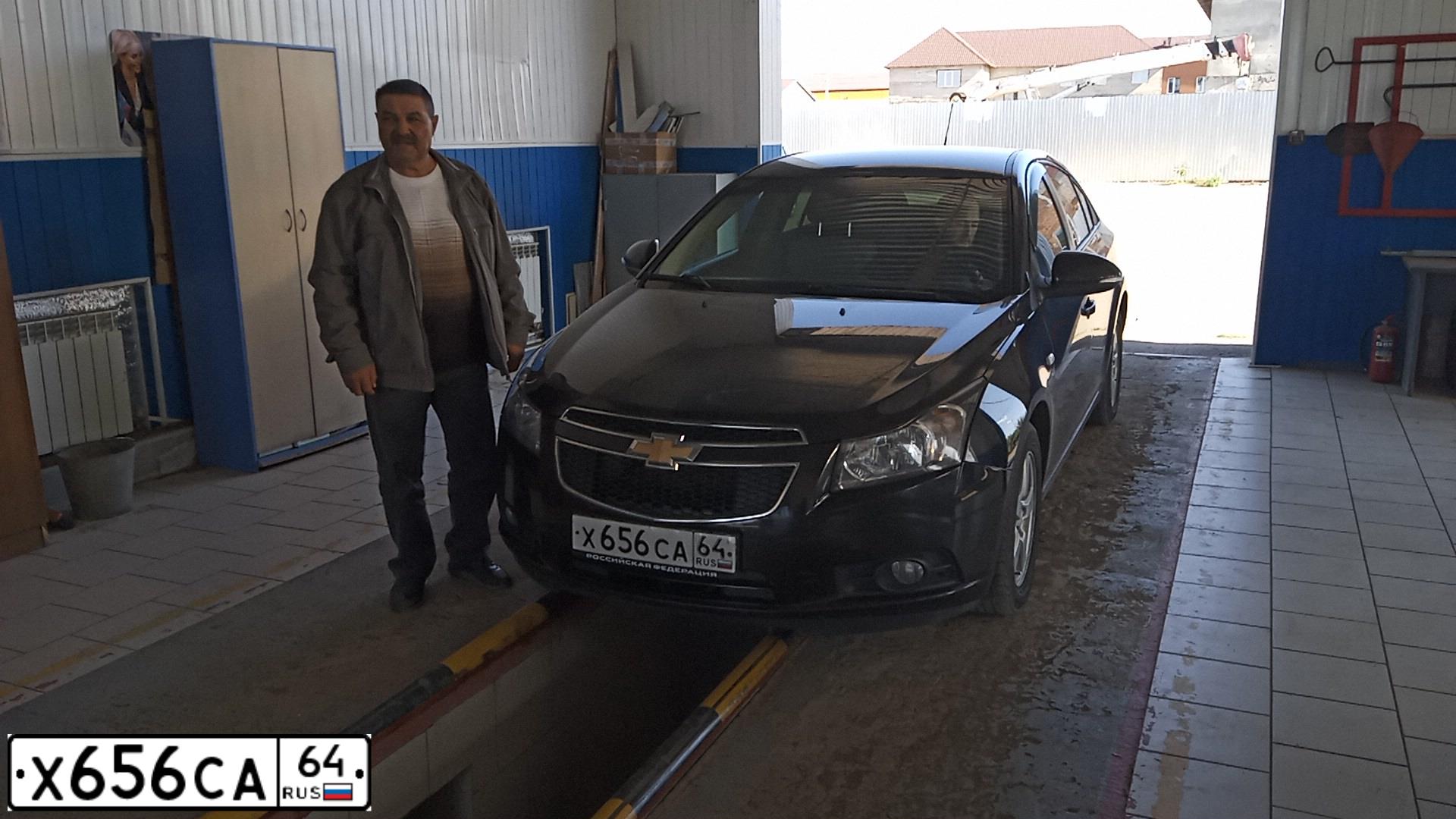 Фото автомобиля CHEVROLET CRUZE, 2012 — госномер Х656СА64. Цвет: ЧЕРНЫЙ МЕТАЛИК