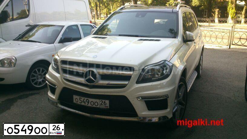 Фото автомобиля AUDI Q7, 2010 — госномер Н222ОС123. Цвет: Белый