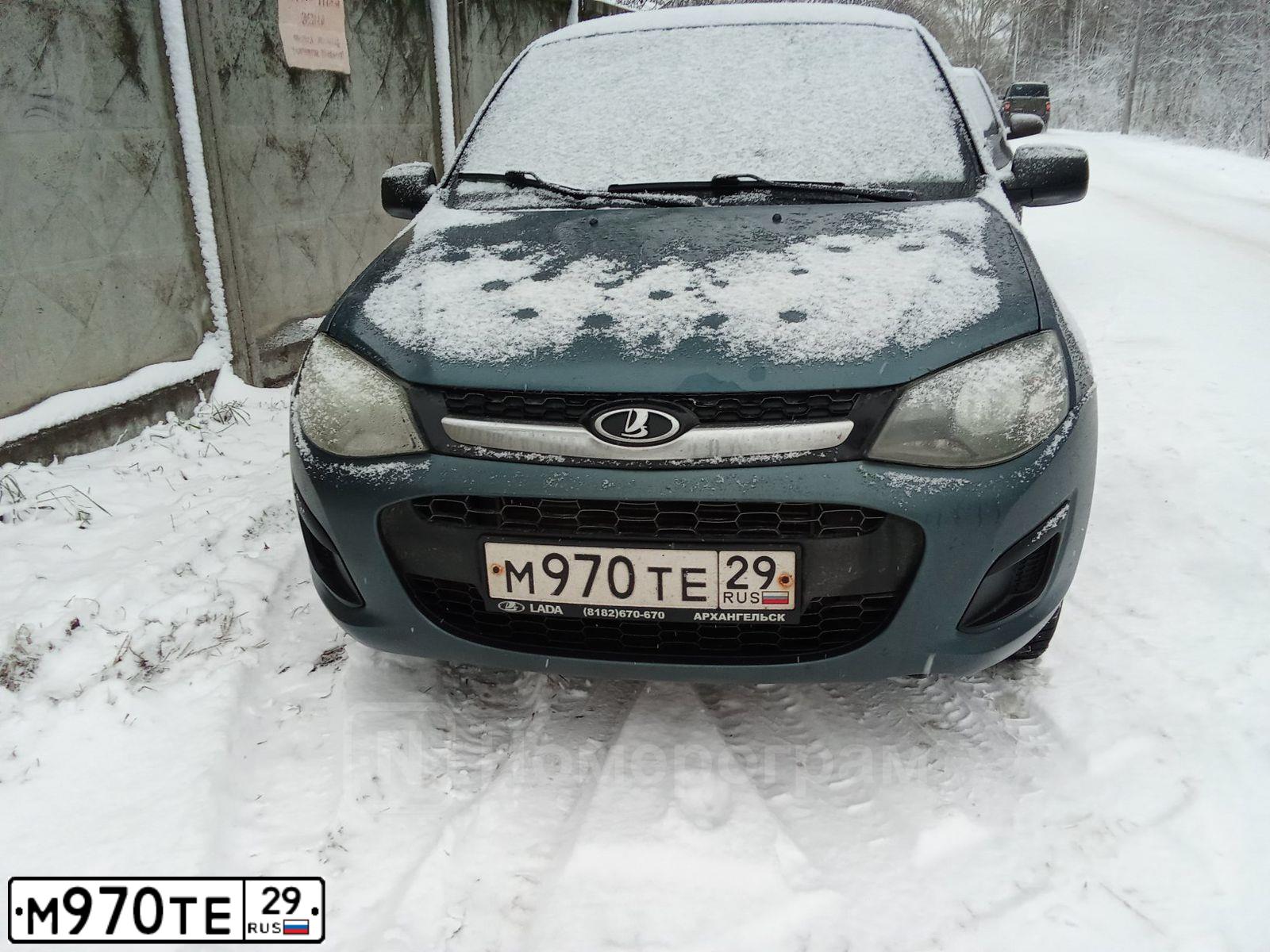 Фото автомобиля LADA 2192 KALINA, 2015 — госномер М970ТЕ29. Цвет: СЕРО-СИНИЙ