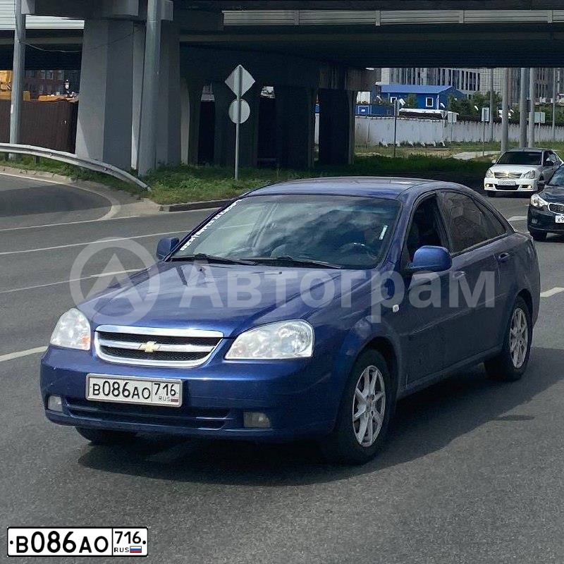 Фото автомобиля CHEVROLET LACETTI, 2012 — госномер В086АО716. Цвет: СИНИЙ