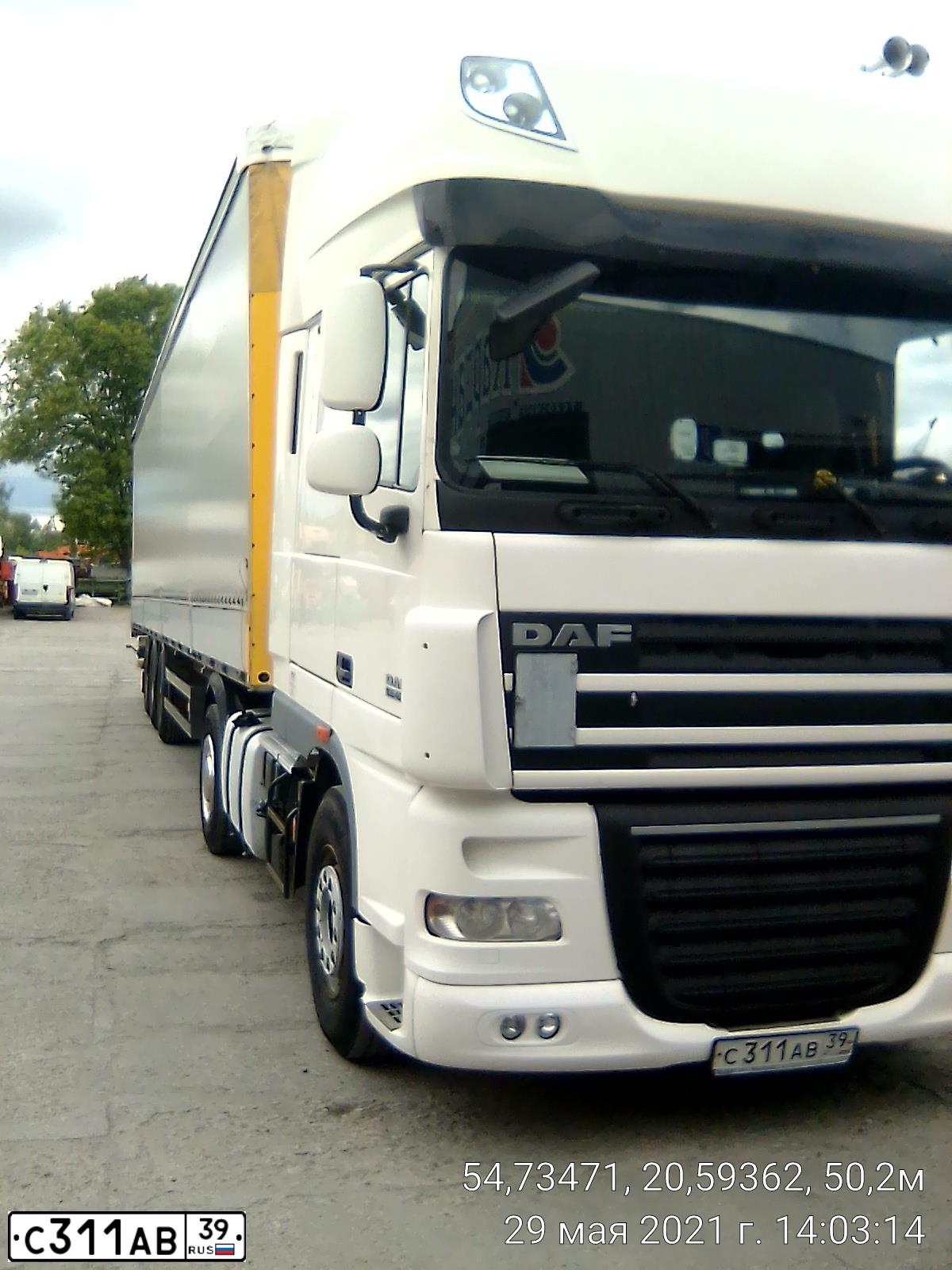 Фото автомобиля DAF XF 105 FT /4X2/, 2011 — госномер С311АВ39. Цвет: БЕЛЫЙ