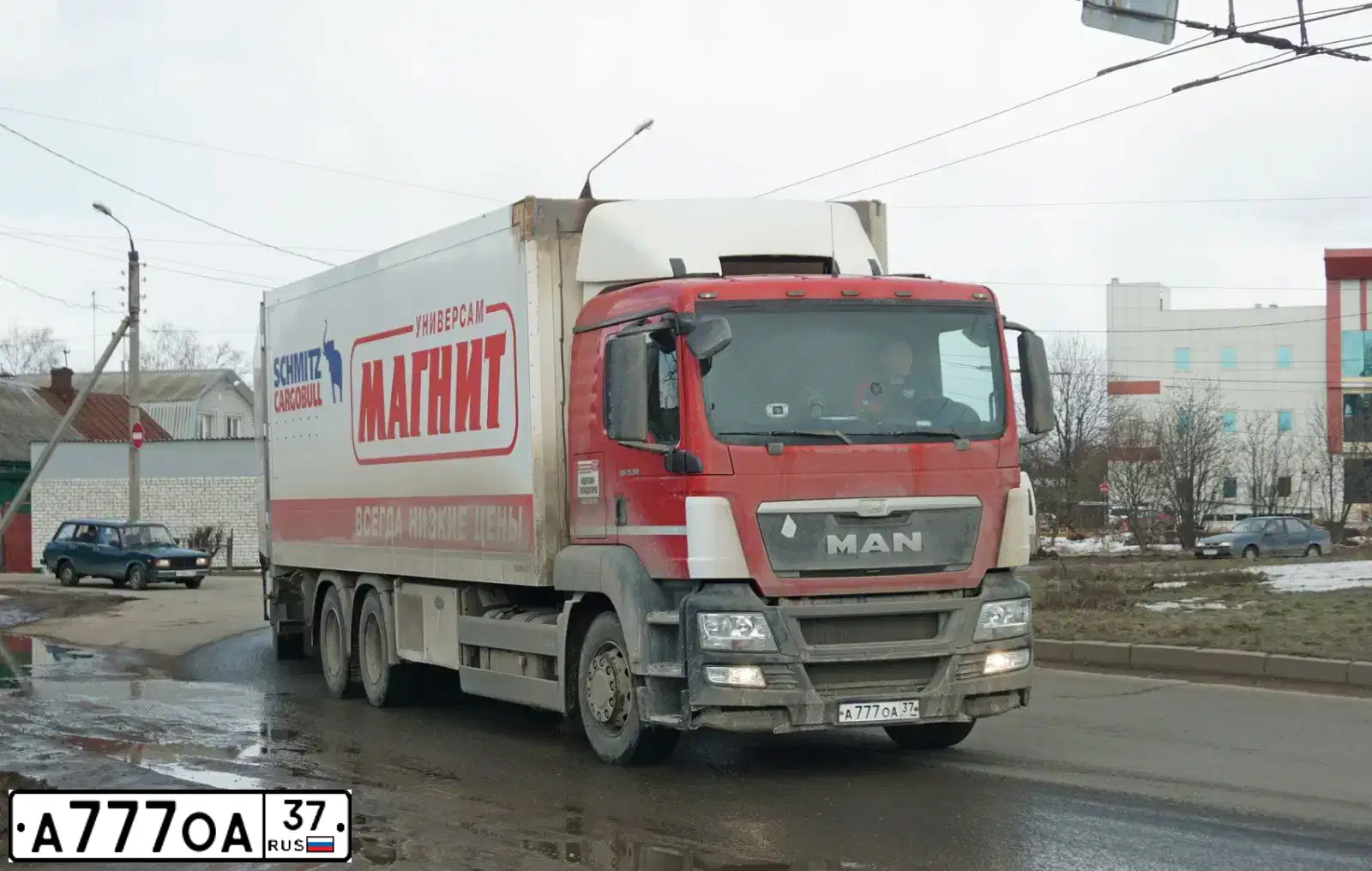 Фото автомобиля MAN N TGS 28.XXX 6X2, 2014 — госномер А777ОА37. Цвет: Красный
