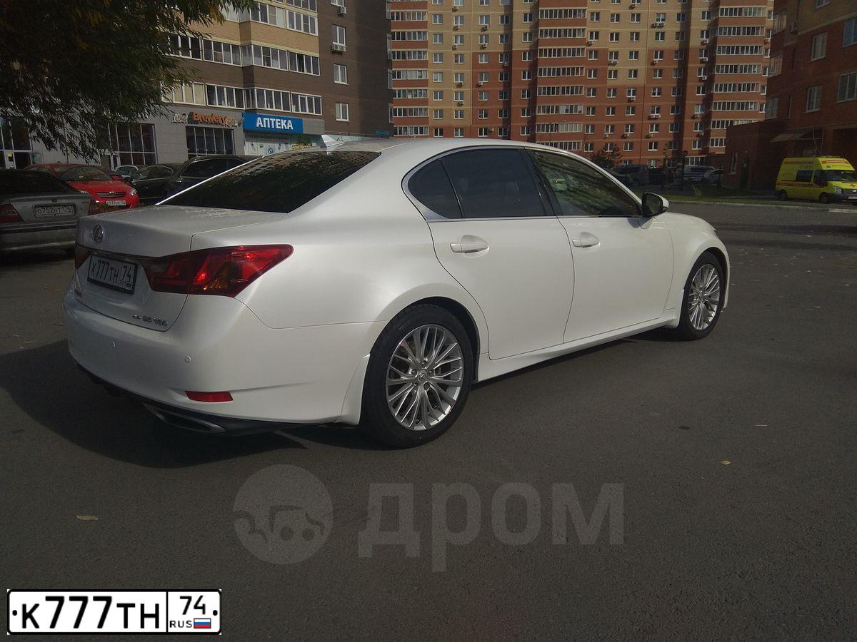 Фото автомобиля LADA 2110, 2004 — госномер К777ТН74. Цвет: СЕРЕБРИСТЫЙ