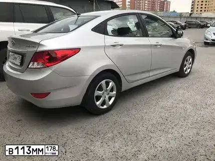Фото автомобиля HYUNDAI SOLARIS, 2012 — госномер Х777ЕУ72. Цвет: Серебристый