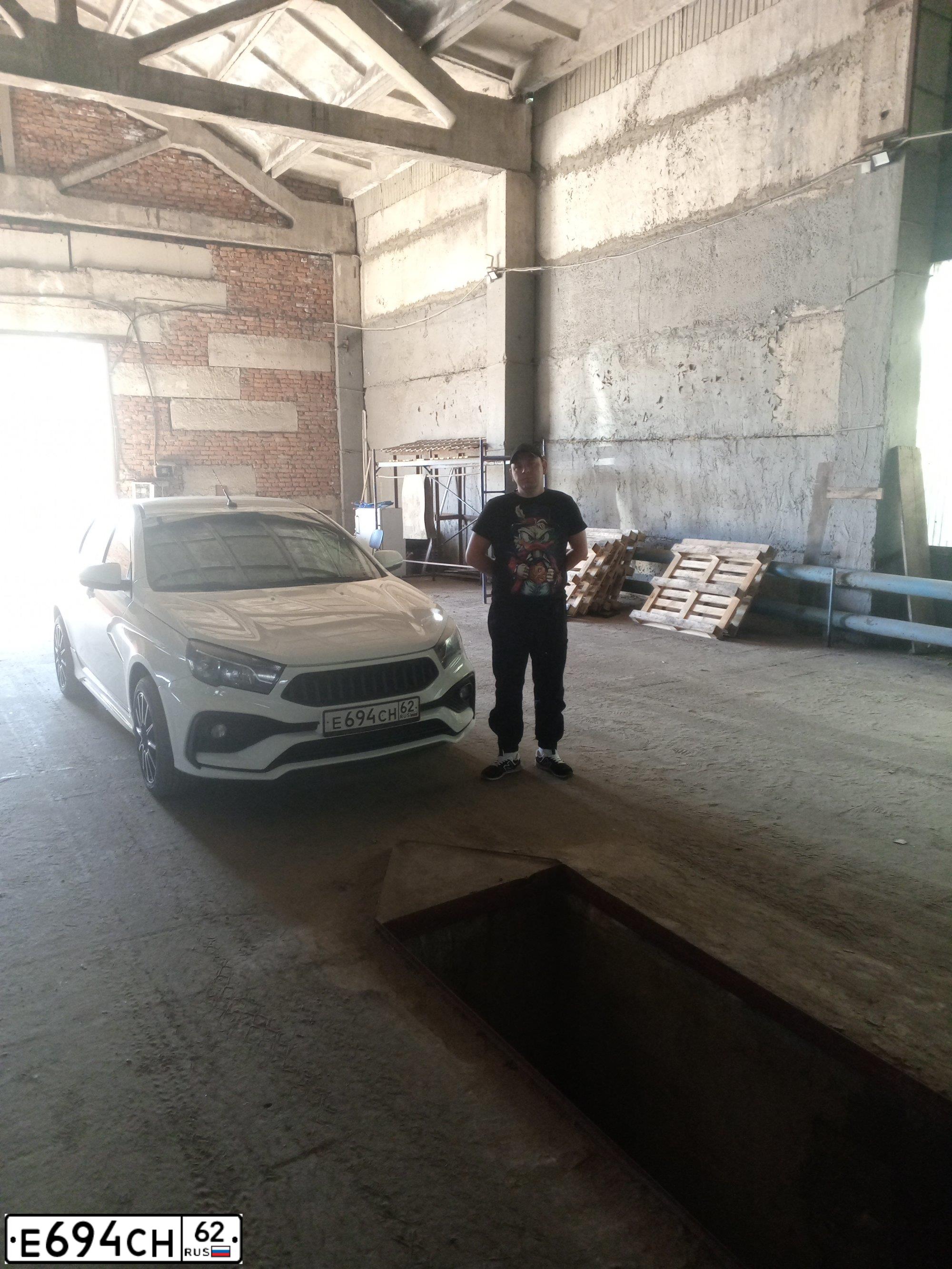 Фото автомобиля LADA VESTA, 2016 — госномер Е694СН62. Цвет: Белый