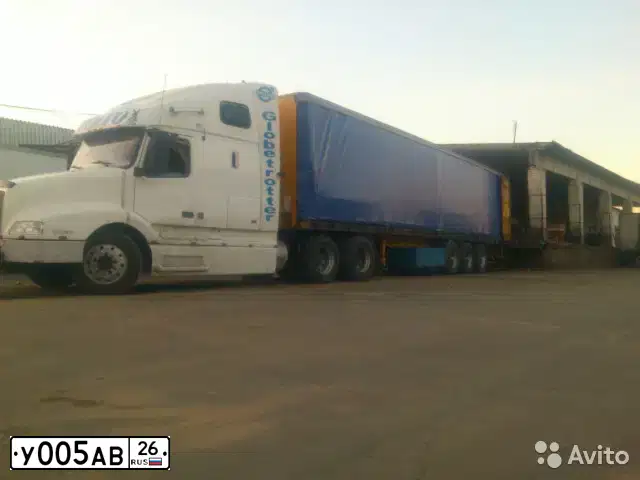 Фото автомобиля VOLVO O SERIE VNL 6X4, 1999 — госномер У005АВ26. Цвет: Белый