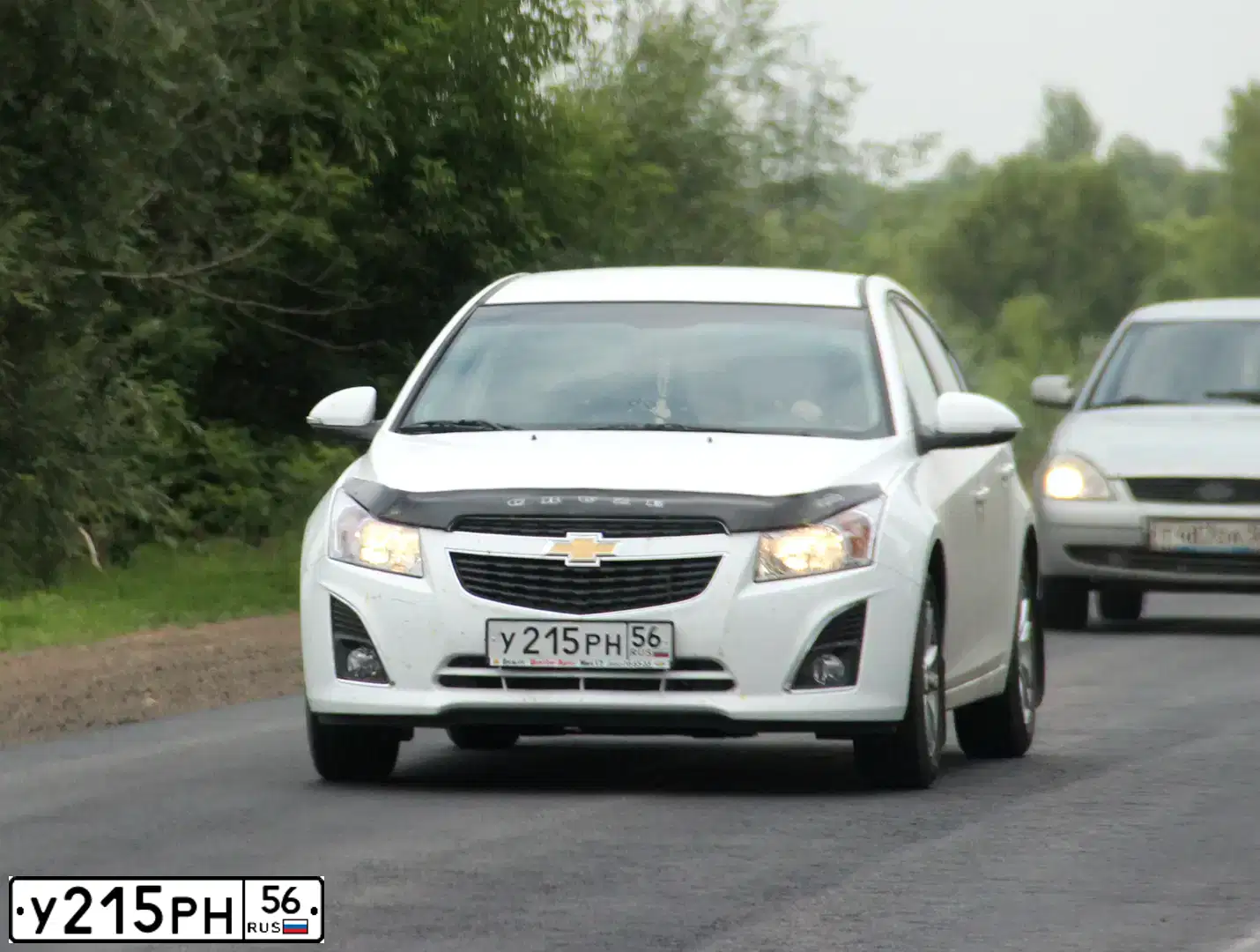 Фото автомобиля CHEVROLET CRUZE, 2014 — госномер У215РН56. Цвет: Белый