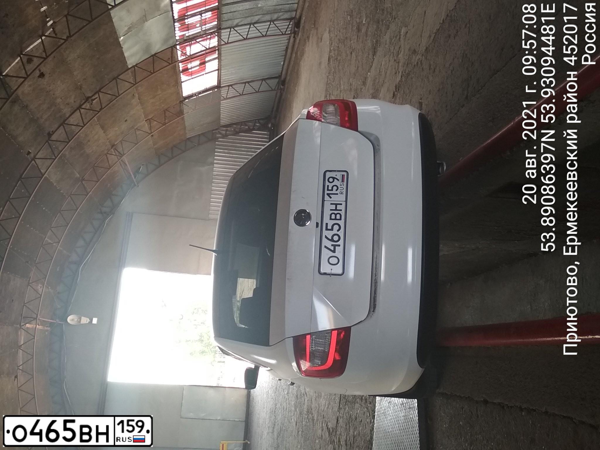 Фото автомобиля SKODA RAPID, 2014 — госномер Н009НН116. Цвет: Белый