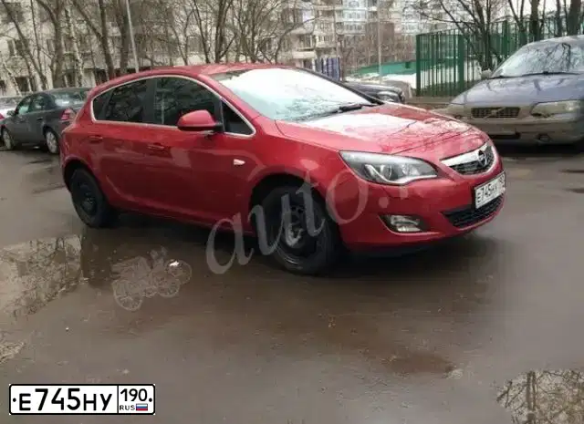 Фото автомобиля OPEL ASTRA, 2011 — госномер С056КН57. Цвет: Красный