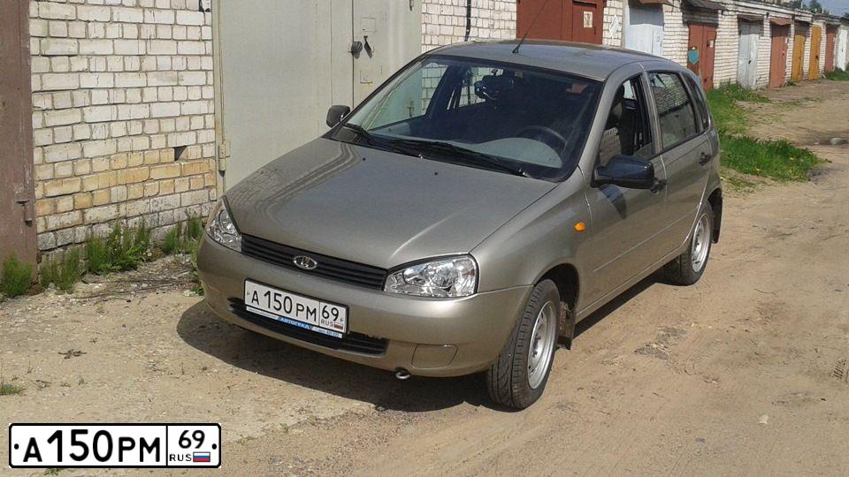 Фото автомобиля LADA 1119 KALINA, 2013 — госномер К293СХ69. Цвет: СЕРО-БЕЖЕВЫЙ