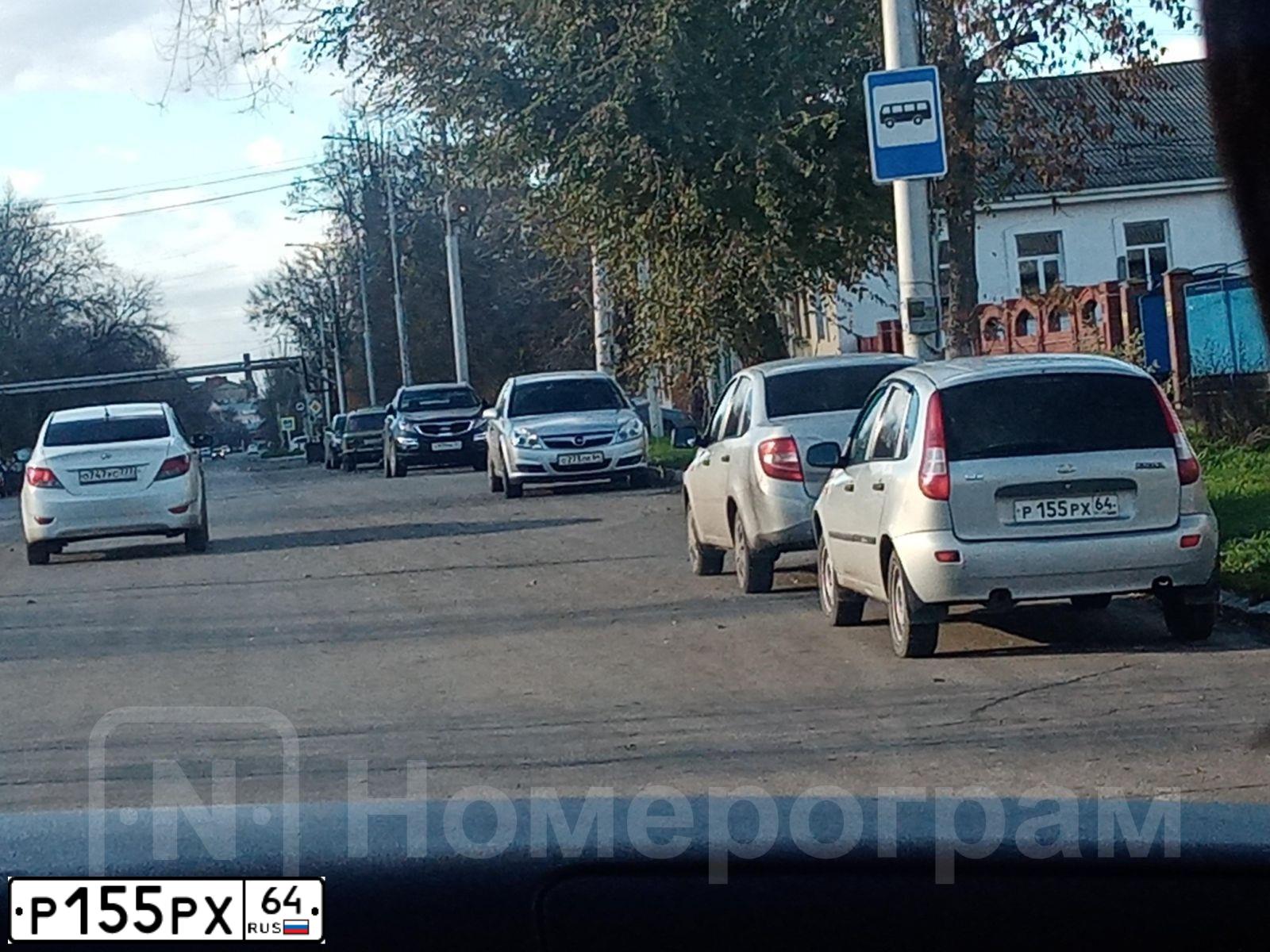 Фото автомобиля LADA 1119 KALINA, 2009 — госномер Р155РХ64. Цвет: СЕРЕБРИСТЫЙ
