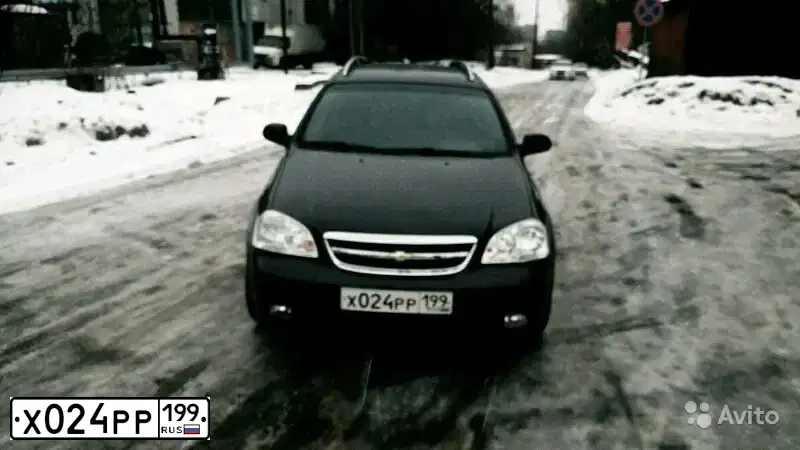 Фото автомобиля CHEVROLET LACETTI, 2008 — госномер Х024РР199. Цвет: ЧЕРНЫЙ