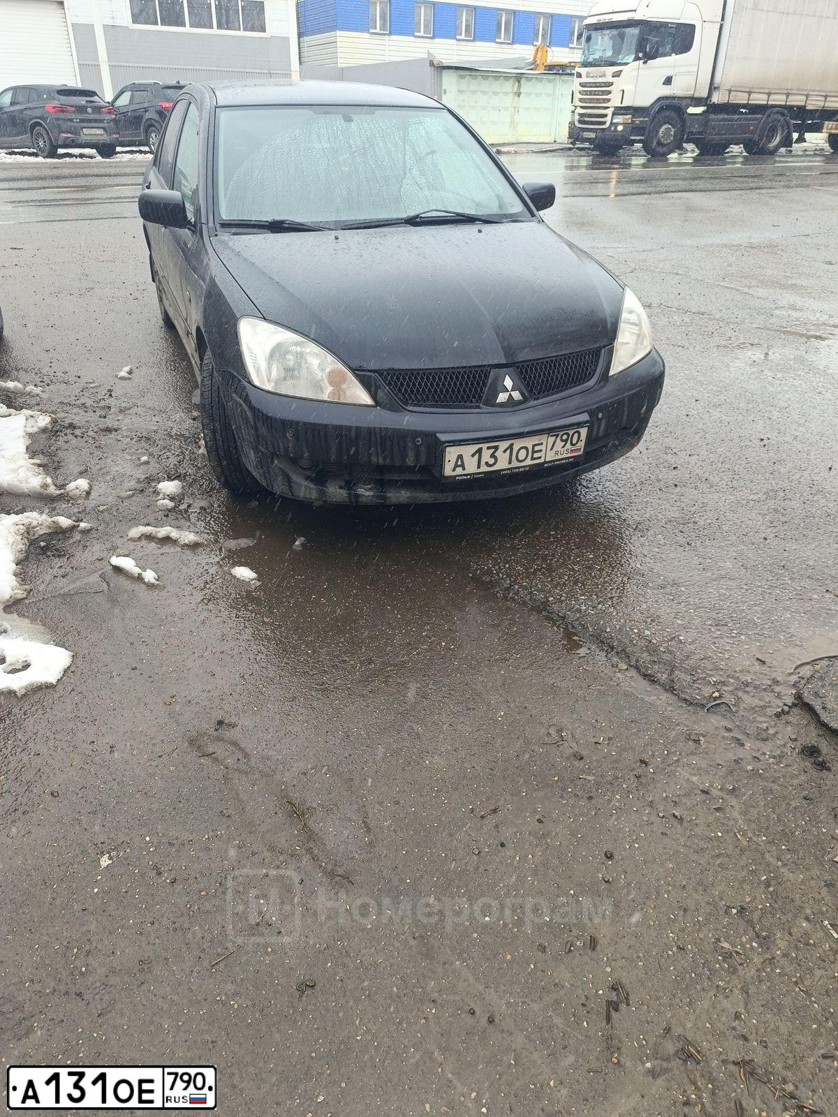 Фото автомобиля MITSUBISHI LANCER, 2007 — госномер А131ОЕ790. Цвет: ЧЕРНЫЙ