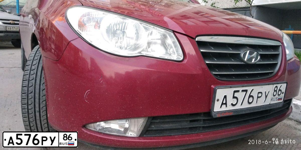 Фото автомобиля HYUNDAI ELANTRA, 2007 — госномер А576РУ86. Цвет: Красный