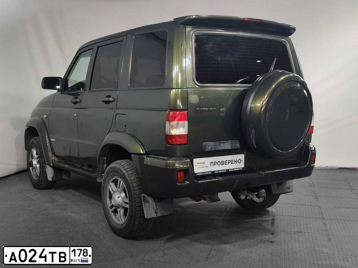 Фото автомобиля UAZ 3164 PATRIOT, 2010 — госномер А024ТВ178. Цвет: Золотисто-зеленый металик