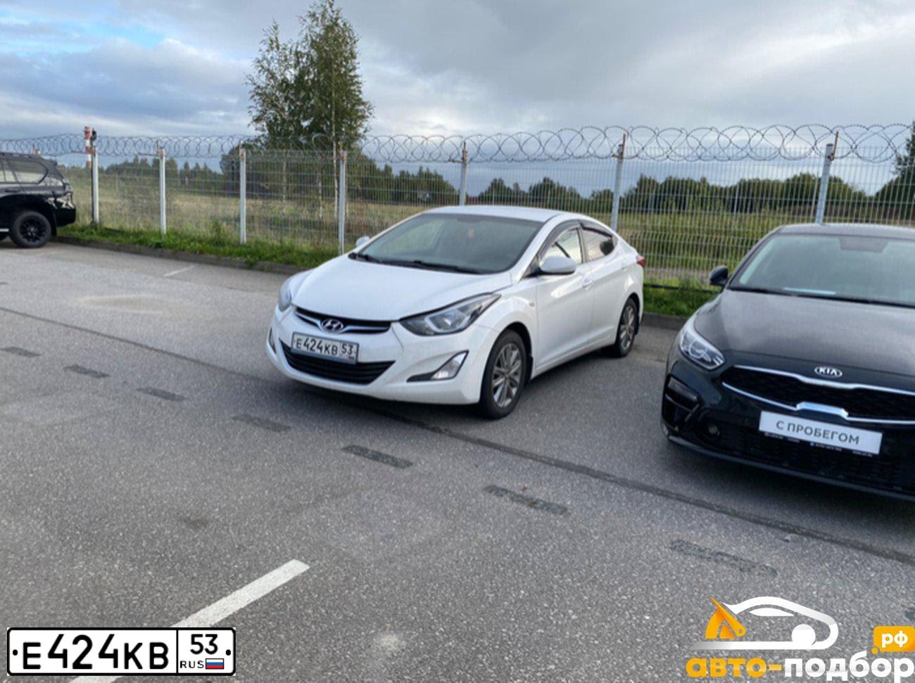 Фото автомобиля HYUNDAI ELANTRA, 2015 — госномер Е021ЕЕ774. Цвет: Белый