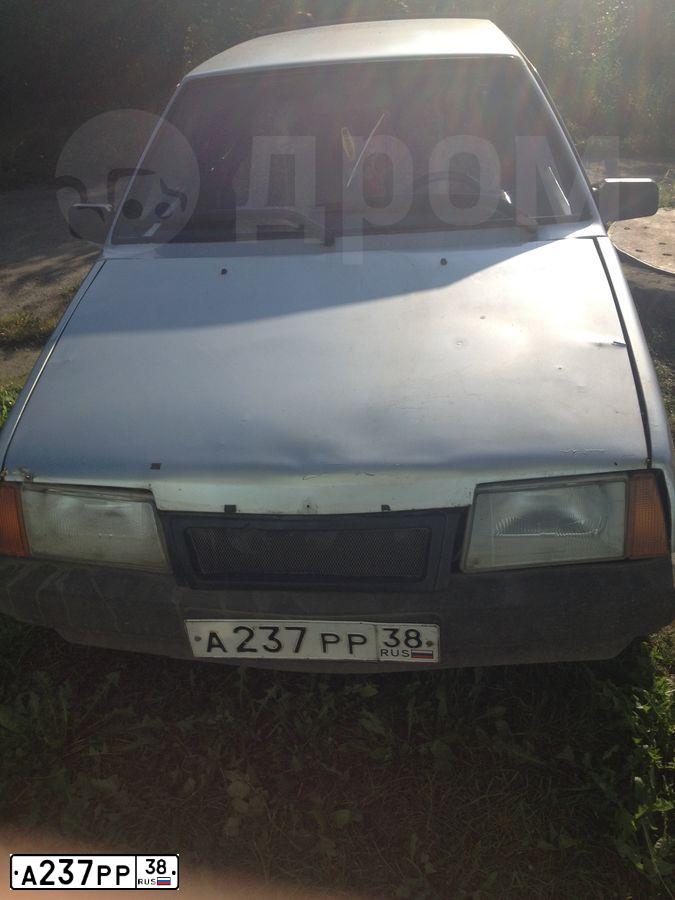 Фото автомобиля LADA 2109 SAMARA, 1997 — госномер А237РР38. Цвет: СВЕТЛО-СЕРЫЙ