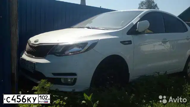 Фото автомобиля KIA RIO, 2015 — госномер С456КУ102. Цвет: Белый