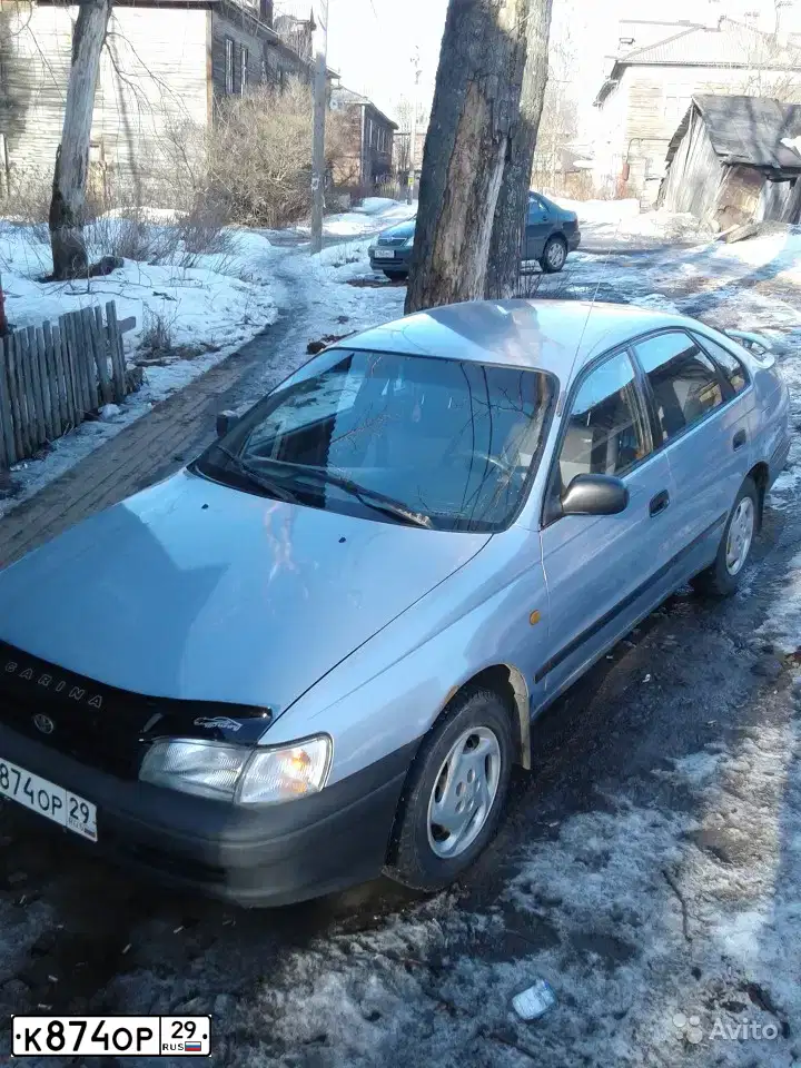 Фото автомобиля TOYOTA CARINA, 1994 — госномер К874ОР29. Цвет: ГОЛУБОЙ