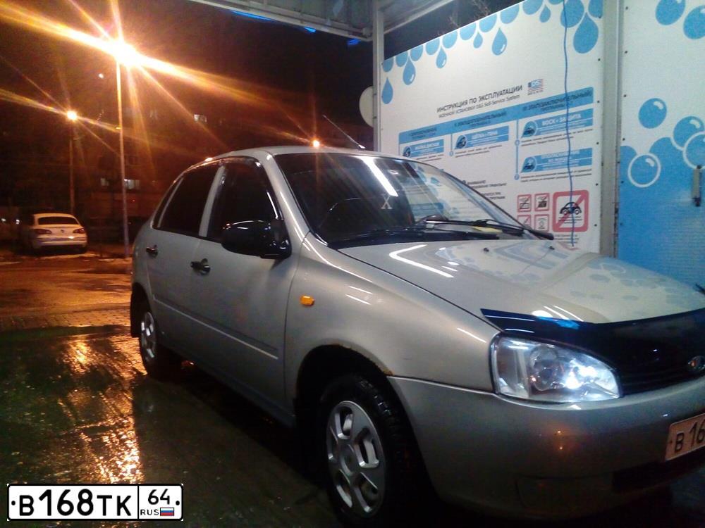 Фото автомобиля LADA 1118 KALINA, 2005 — госномер В168ТК64. Цвет: БЕЖЕВО-СЕРЫЙ