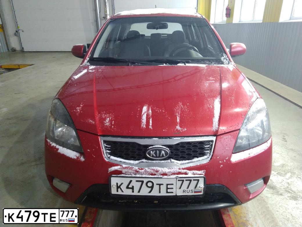 Фото автомобиля KIA RIO, 2010 — госномер О814КС27. Цвет: КРАСНЫЙ