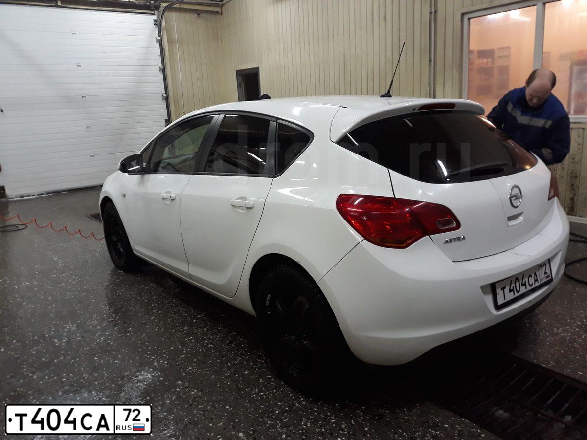 Фото автомобиля OPEL ASTRA, 2012 — госномер Т404СА72. Цвет: БЕЛЫЙ