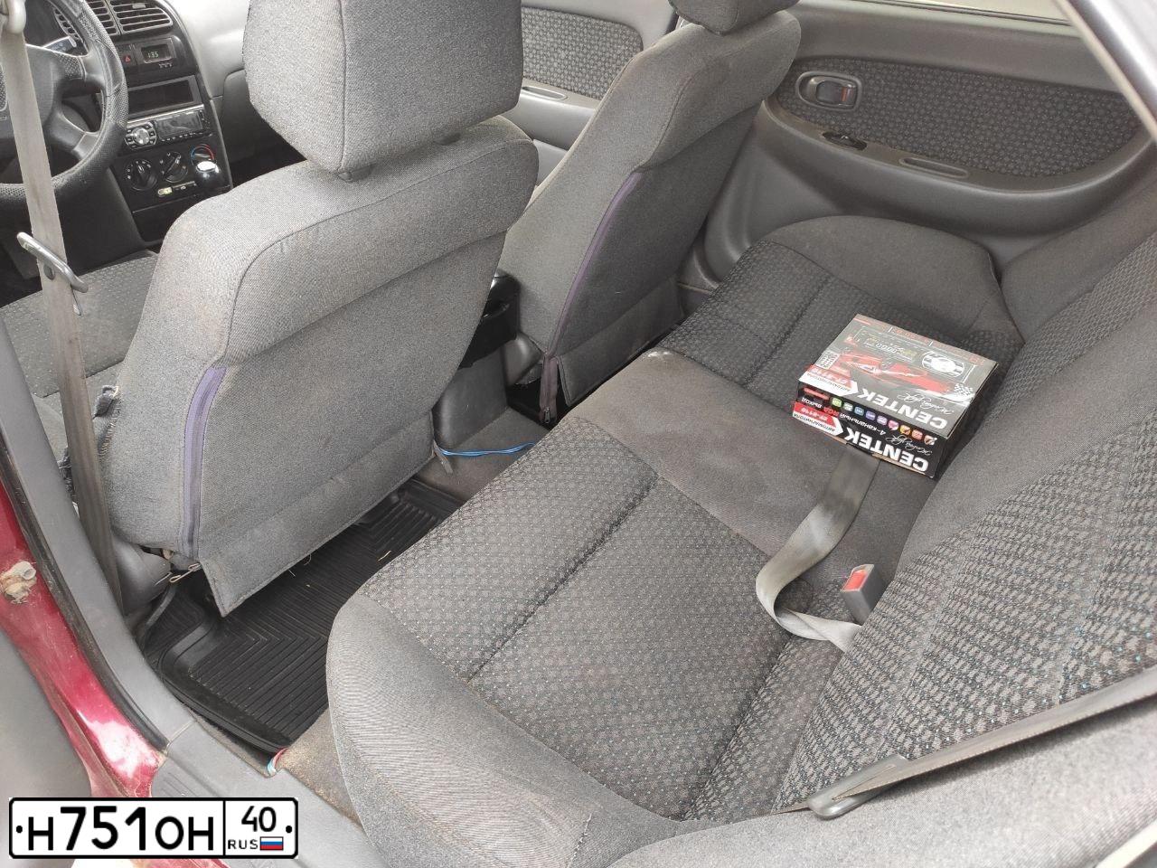 Фото автомобиля KIA SHUMA, 2004 — госномер Т220ТК33. Цвет: БОРДОВЫЙ