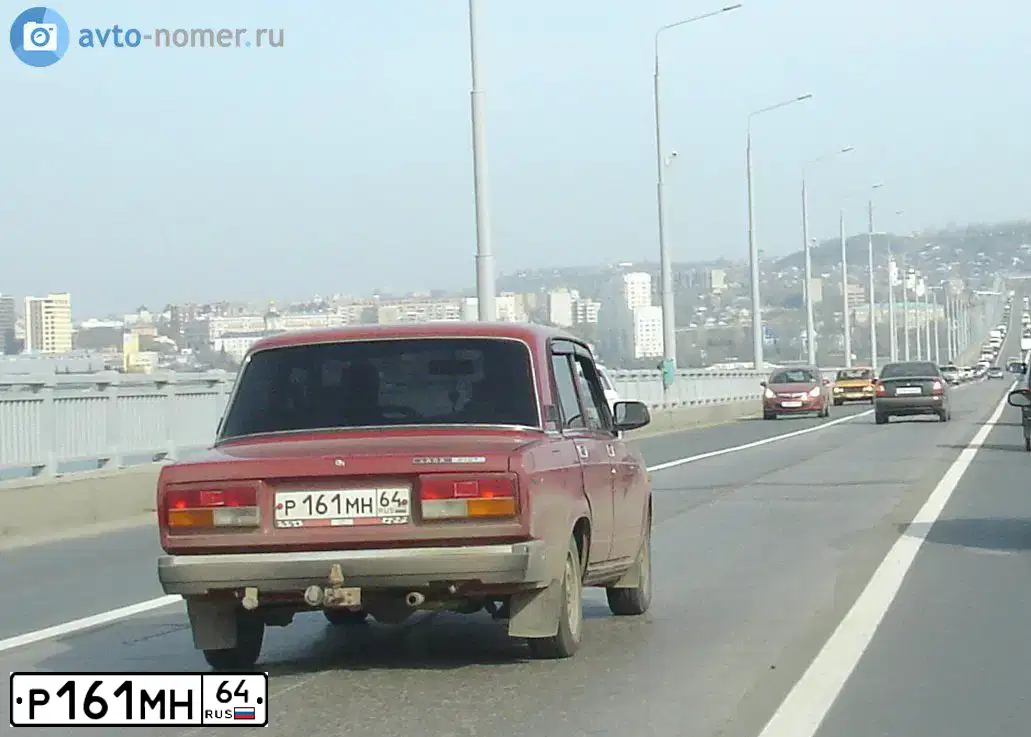 Фото автомобиля FORD FIESTA / ASPIRE, 2006 — госномер Р161ММ64. Цвет: Красный