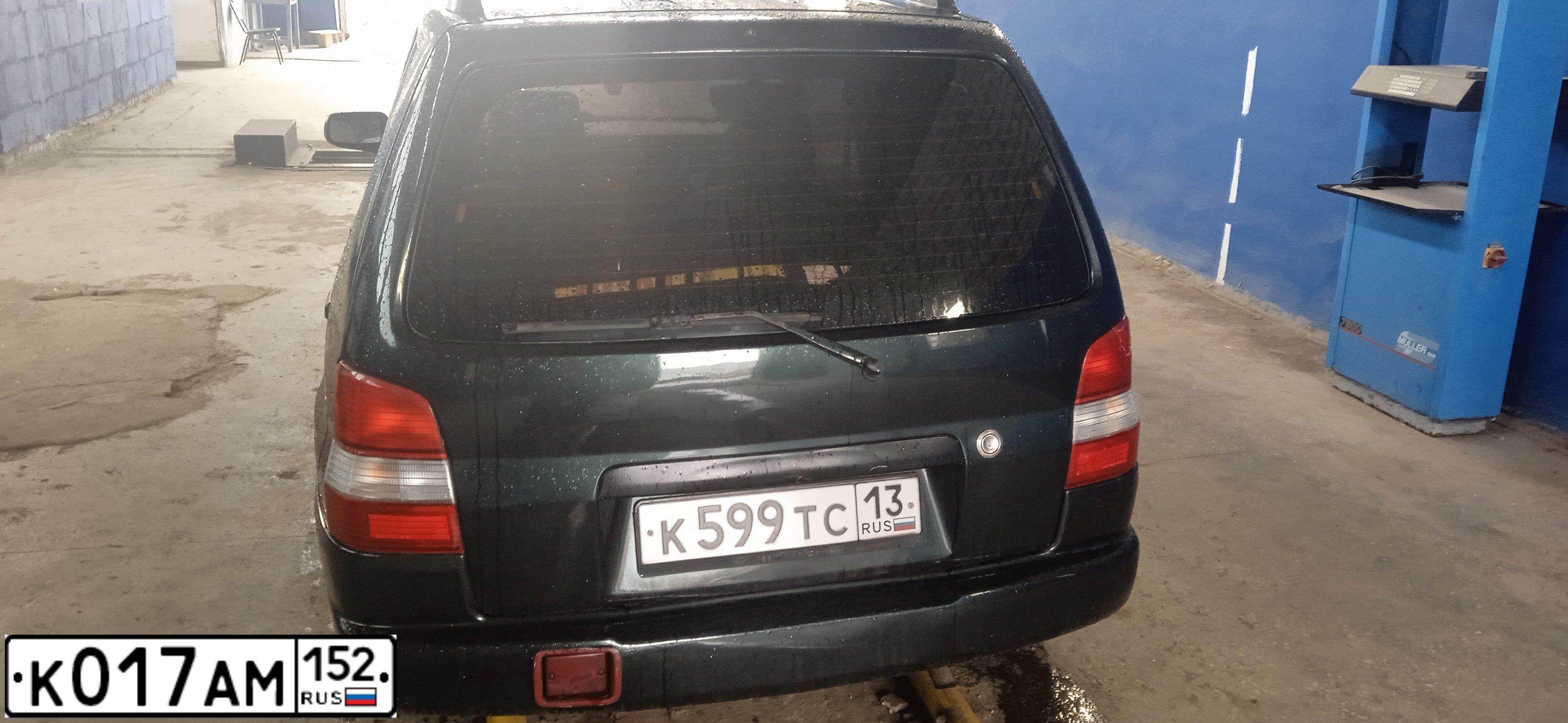 Фото автомобиля MAZDA DEMIO, 1999 — госномер Т949ХС73. Цвет: Темно-зеленый