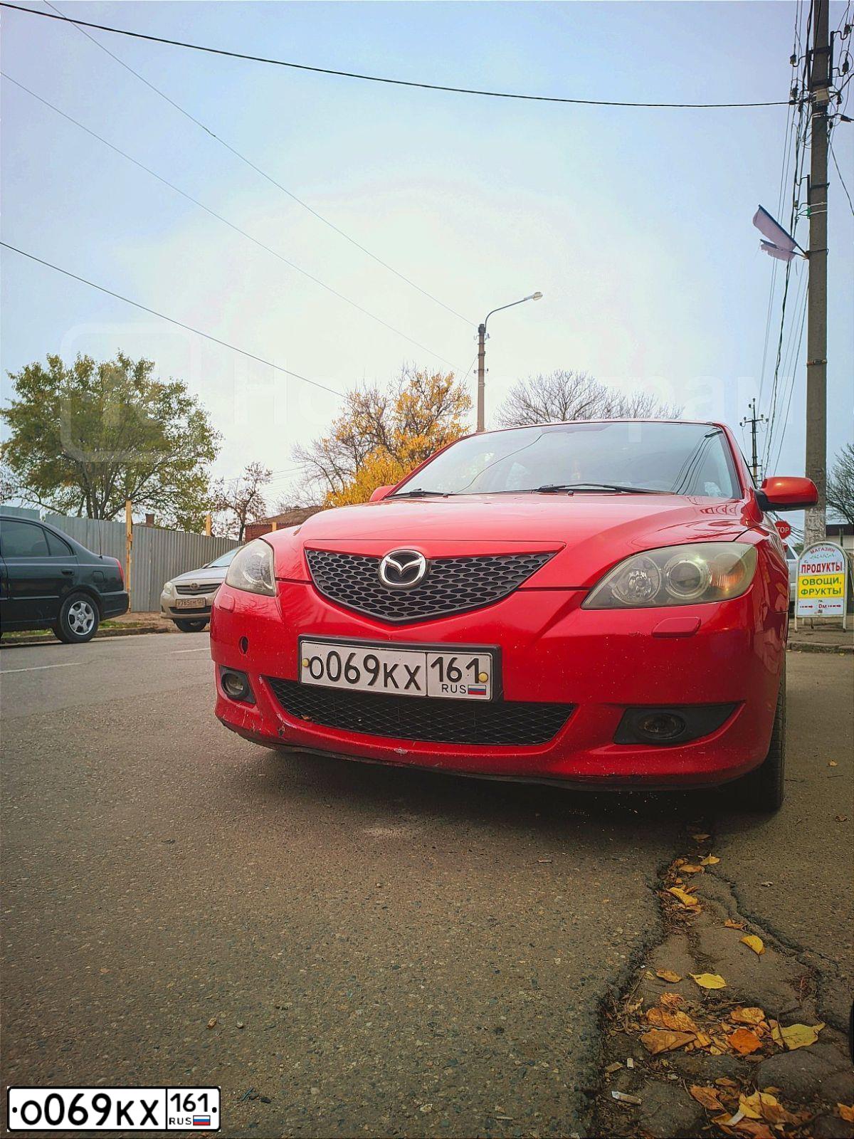 Фото автомобиля MAZDA 3, 2005 — госномер О069КХ161. Цвет: КРАСНЫЙ