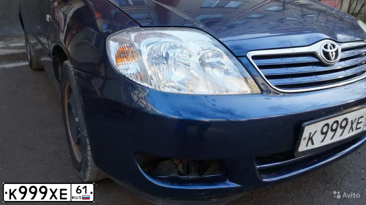 Фото автомобиля TOYOTA COROLLA, 2006 — госномер К999ХЕ61. Цвет: Темно-синий