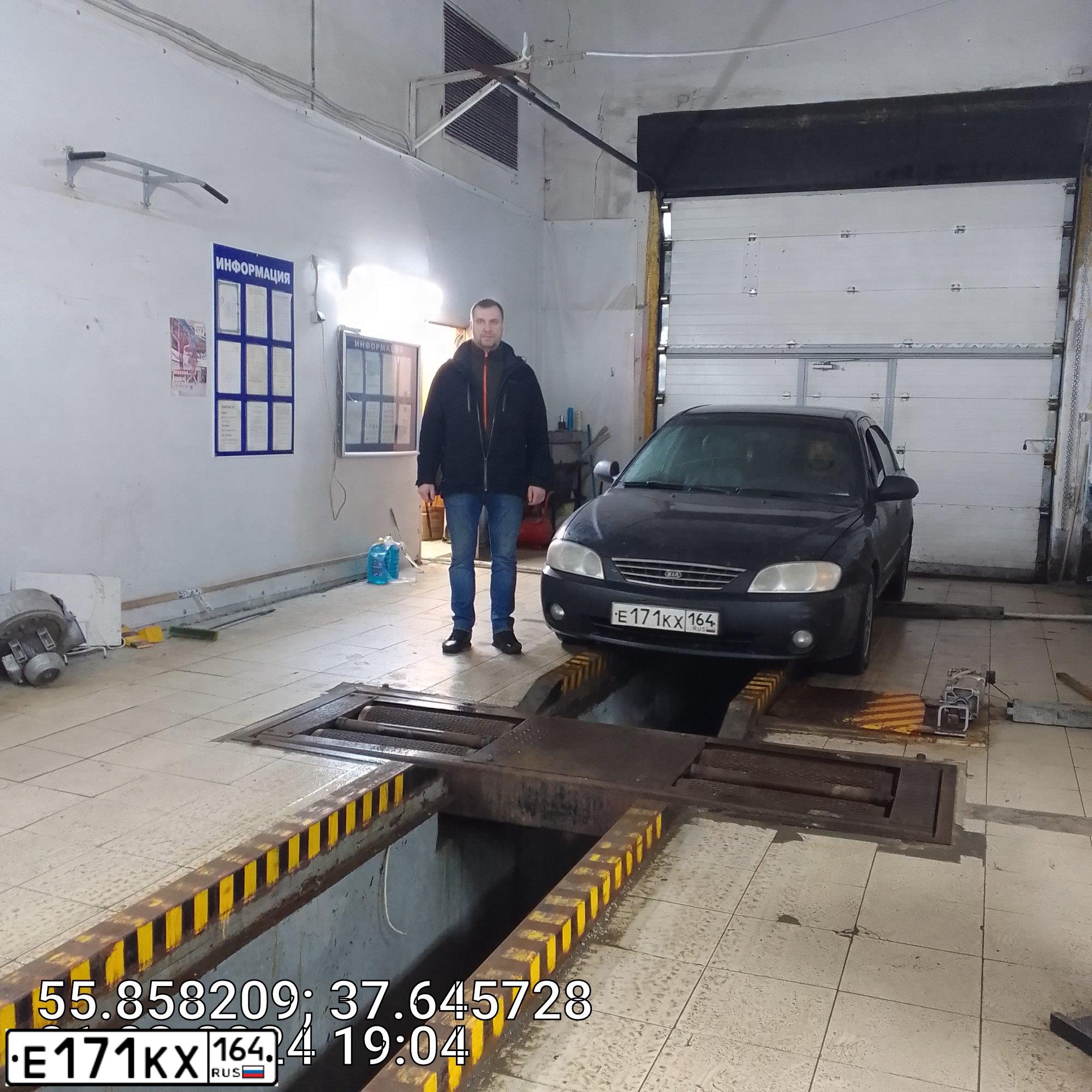 Фото автомобиля KIA SPECTRA, 2008 — госномер Х982НУ37. Цвет: ЧЕРНЫЙ ЖЕМЧУГ