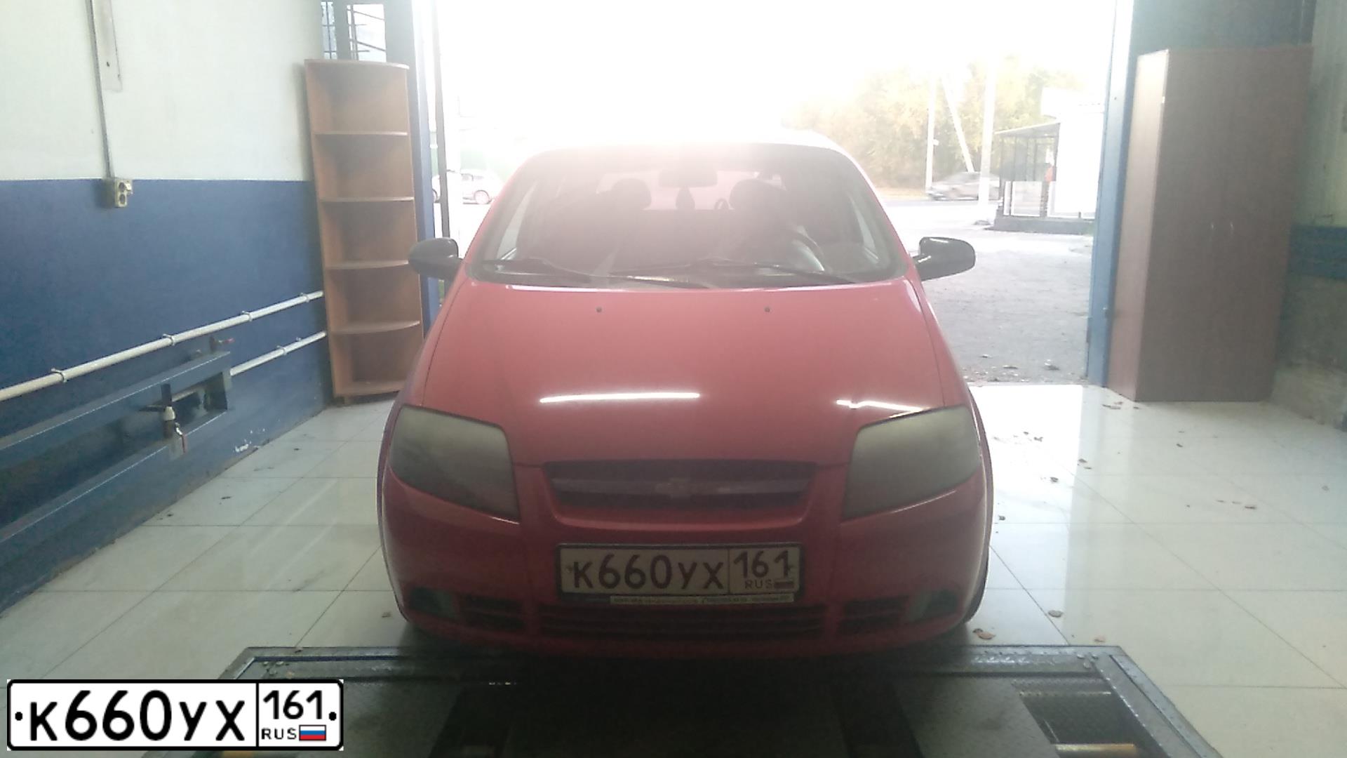 Фото автомобиля CHEVROLET AVEO, 2007 — госномер К660УХ161. Цвет: Красный
