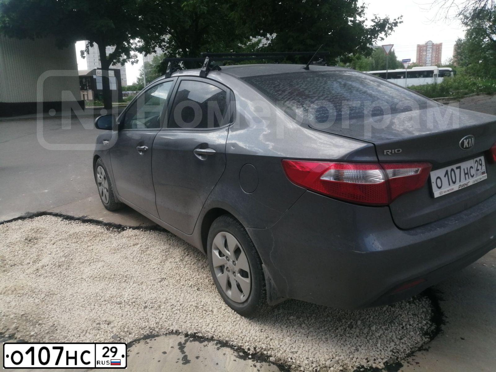 Фото автомобиля KIA RIO, 2014 — госномер О107НС29. Цвет: ТЕМНО-СЕРЫЙ