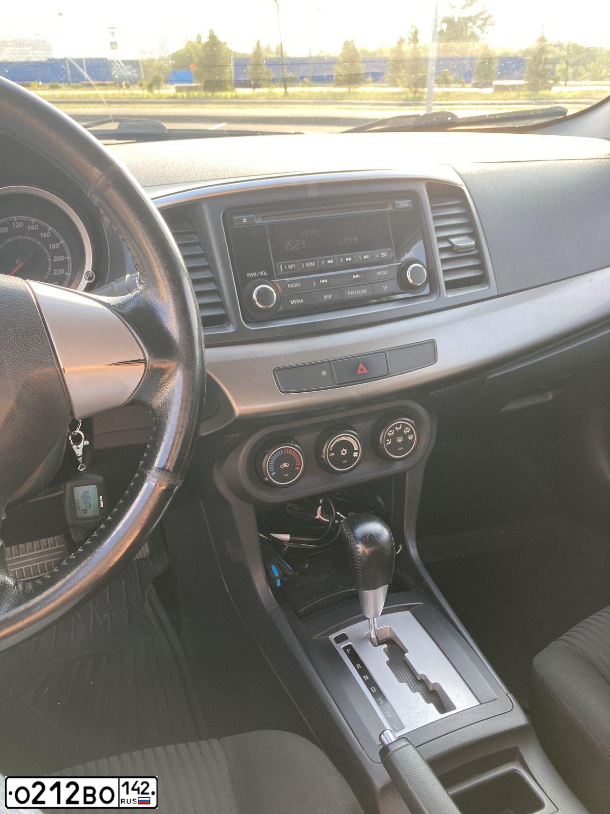 Фото автомобиля MITSUBISHI ASX, 2010 — госномер О212ВО142. Цвет: ЧЕРНЫЙ