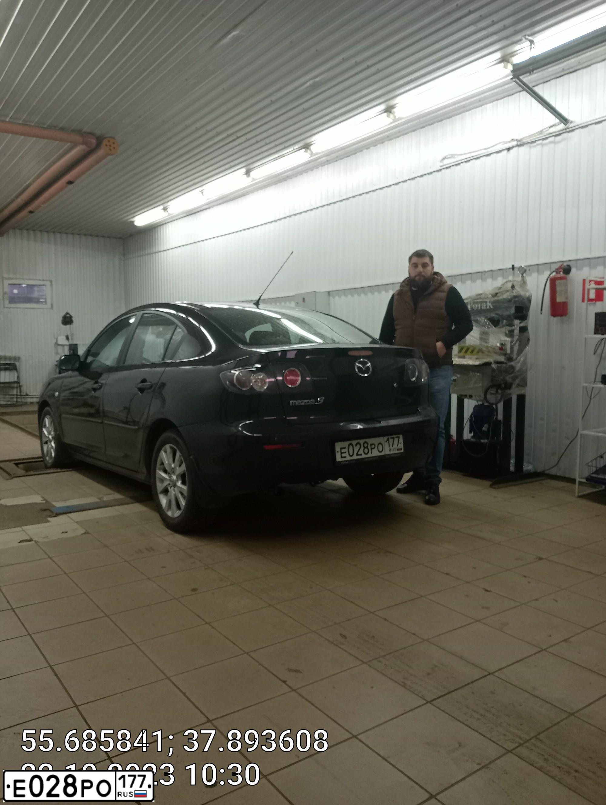 Фото автомобиля MAZDA 3, 2006 — госномер К199КМ977. Цвет: ЧЕРНЫЙ