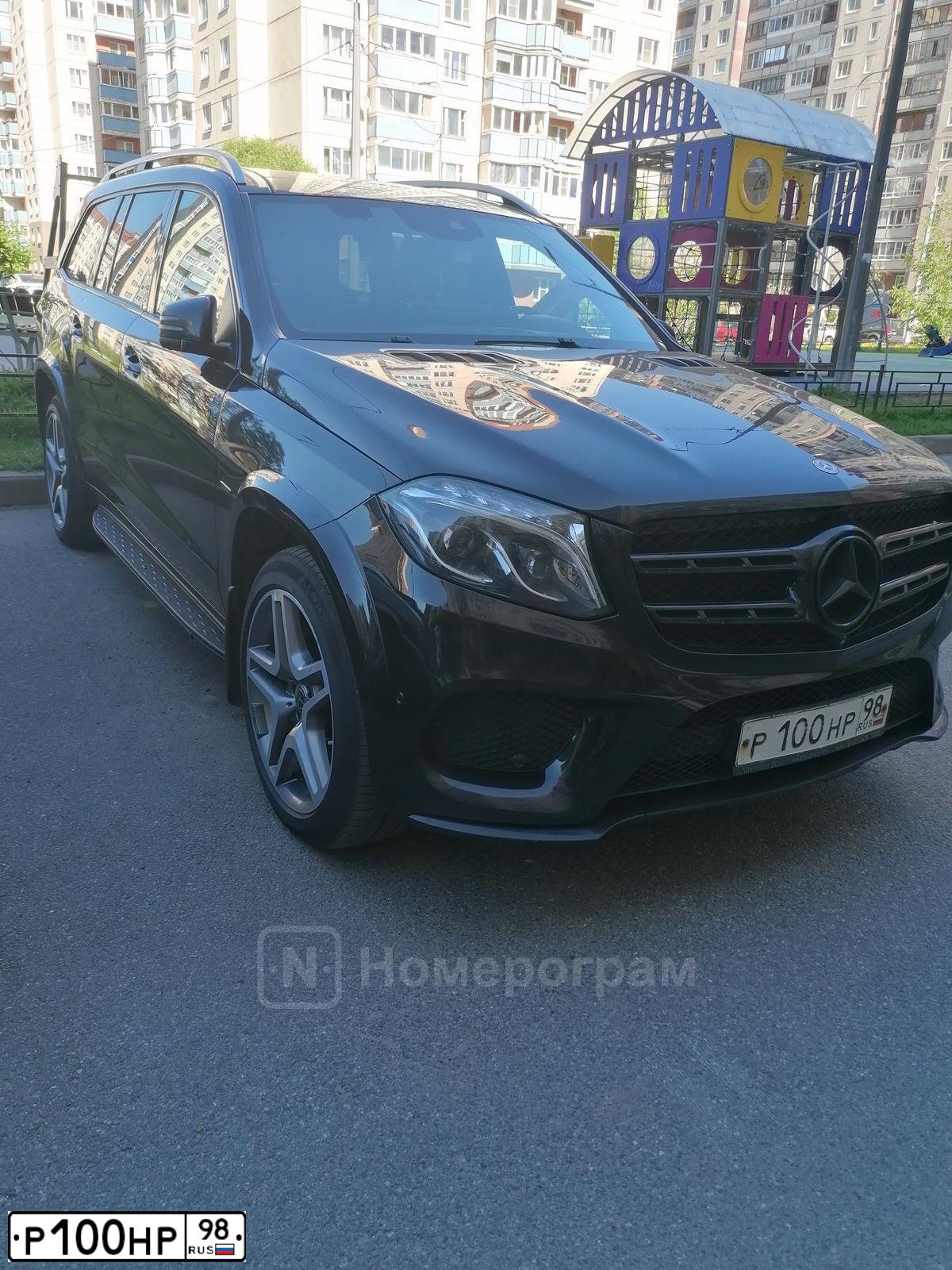 Фото автомобиля KIA SORENTO, 2012 — госномер Р100НР98. Цвет: ЧЕРНЫЙ
