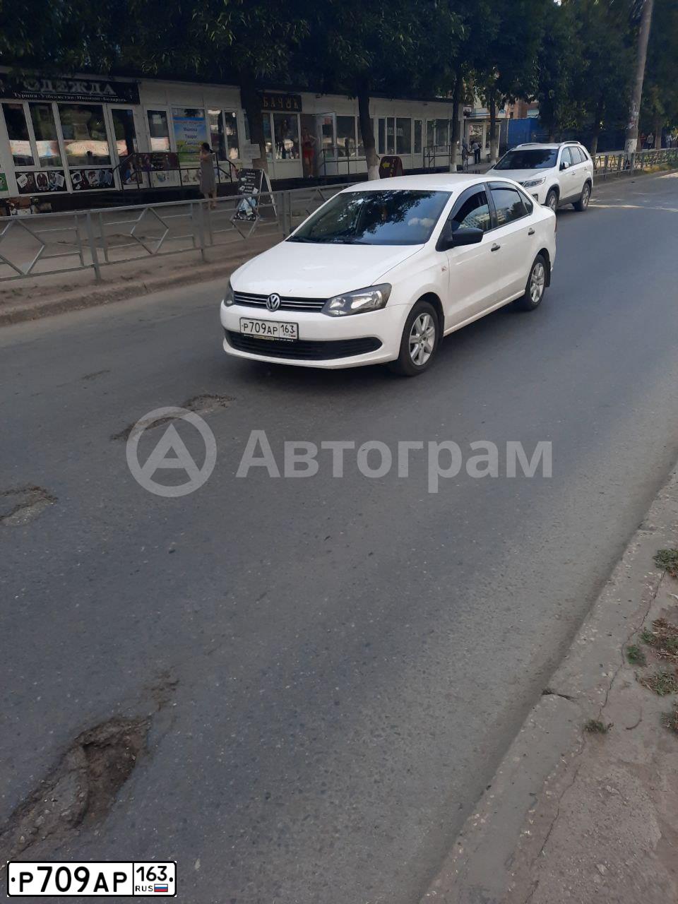 Фото автомобиля VOLKSWAGEN POLO, 2011 — госномер Р709АР163. Цвет: БЕЛЫЙ