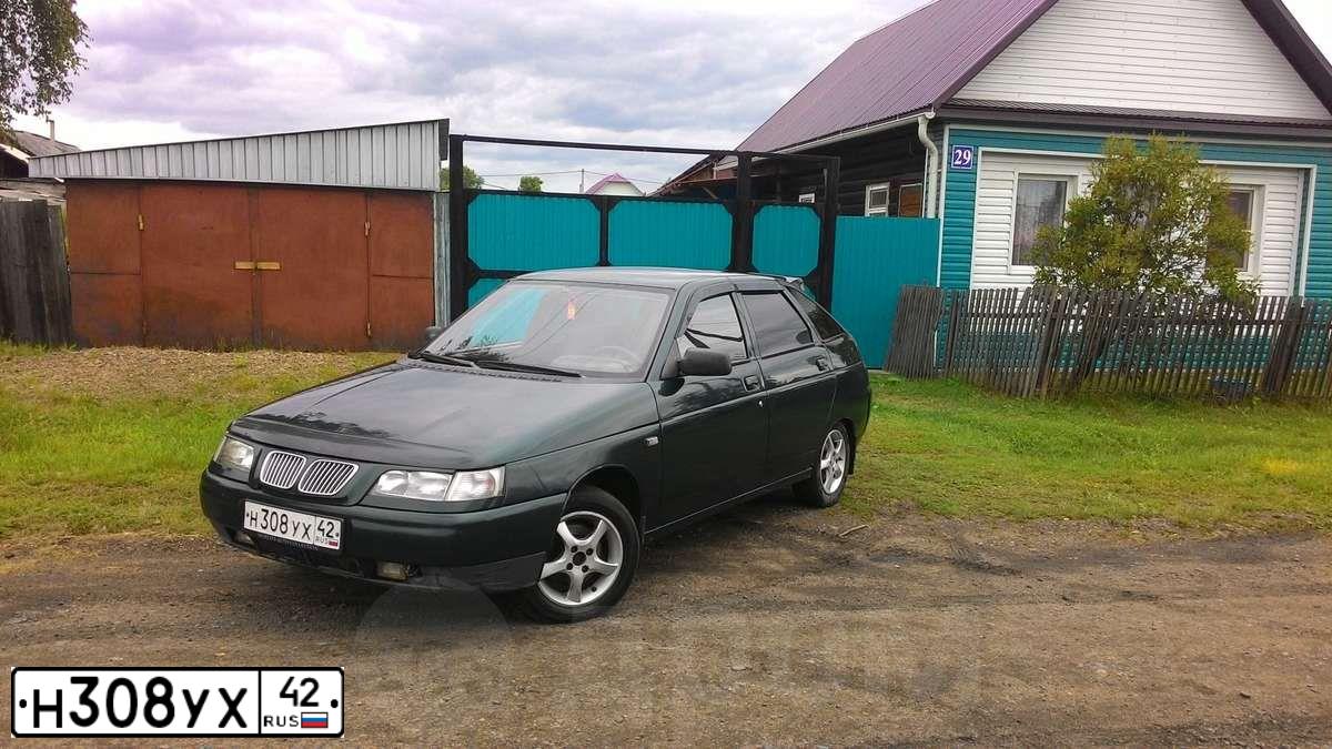 Фото автомобиля LADA 2112, 2002 — госномер М592ТТ124. Цвет: Темно-зеленый