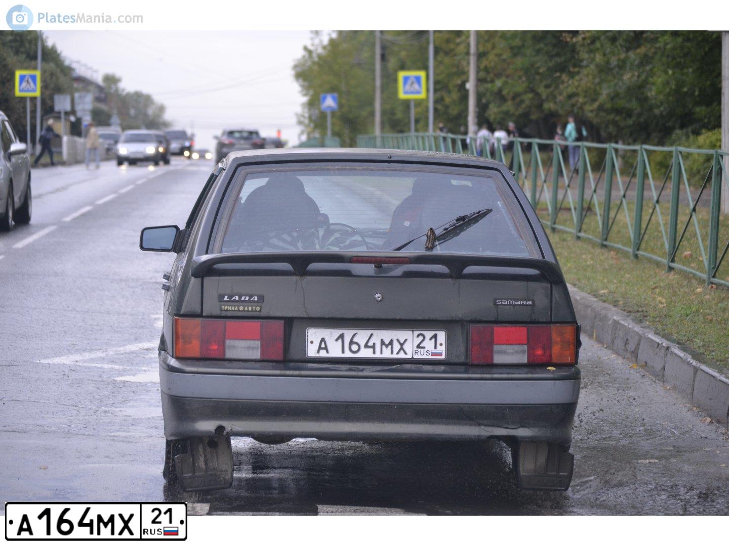 Фото автомобиля LADA 2114 SAMARA, 2006 — госномер А164МХ21. Цвет: ЗОЛОТИСТЫЙ ТЕМНО-ЗЕЛЕНЫЙ