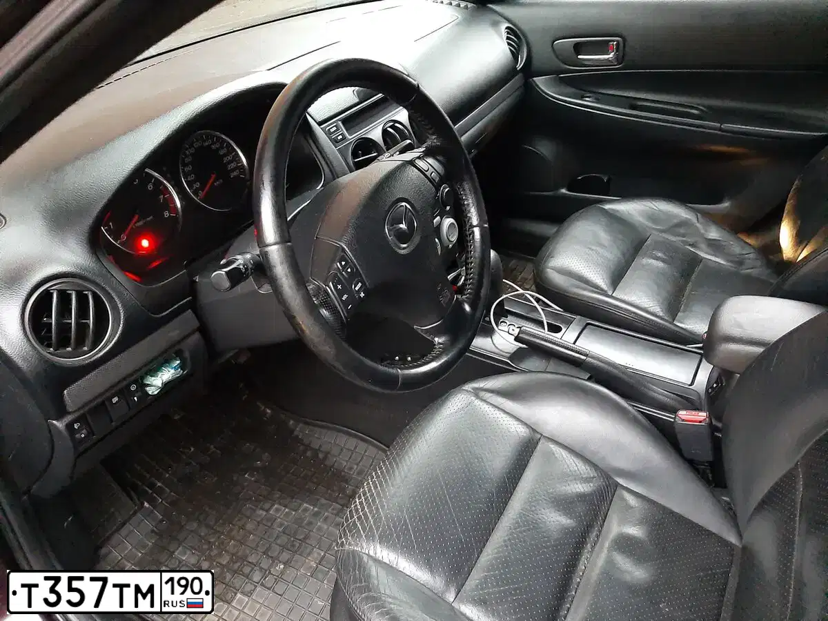Фото автомобиля MAZDA 6, 2004 — госномер К591ММ35. Цвет: ТЕМНО-ВИШНЕВЫЙ