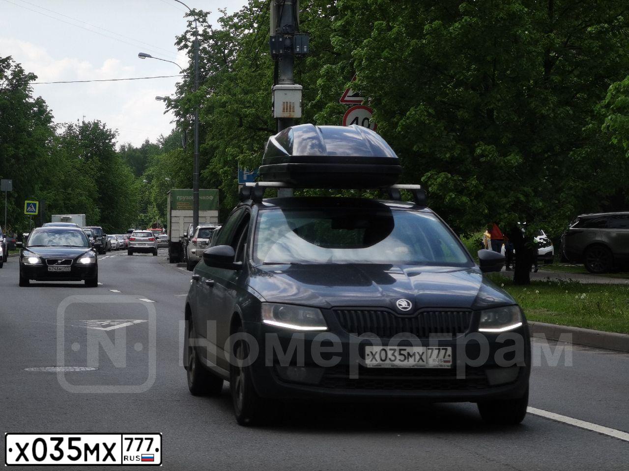 Фото автомобиля SKODA OCTAVIA, 2014 — госномер Х035МХ777. Цвет: ЧЕРНЫЙ