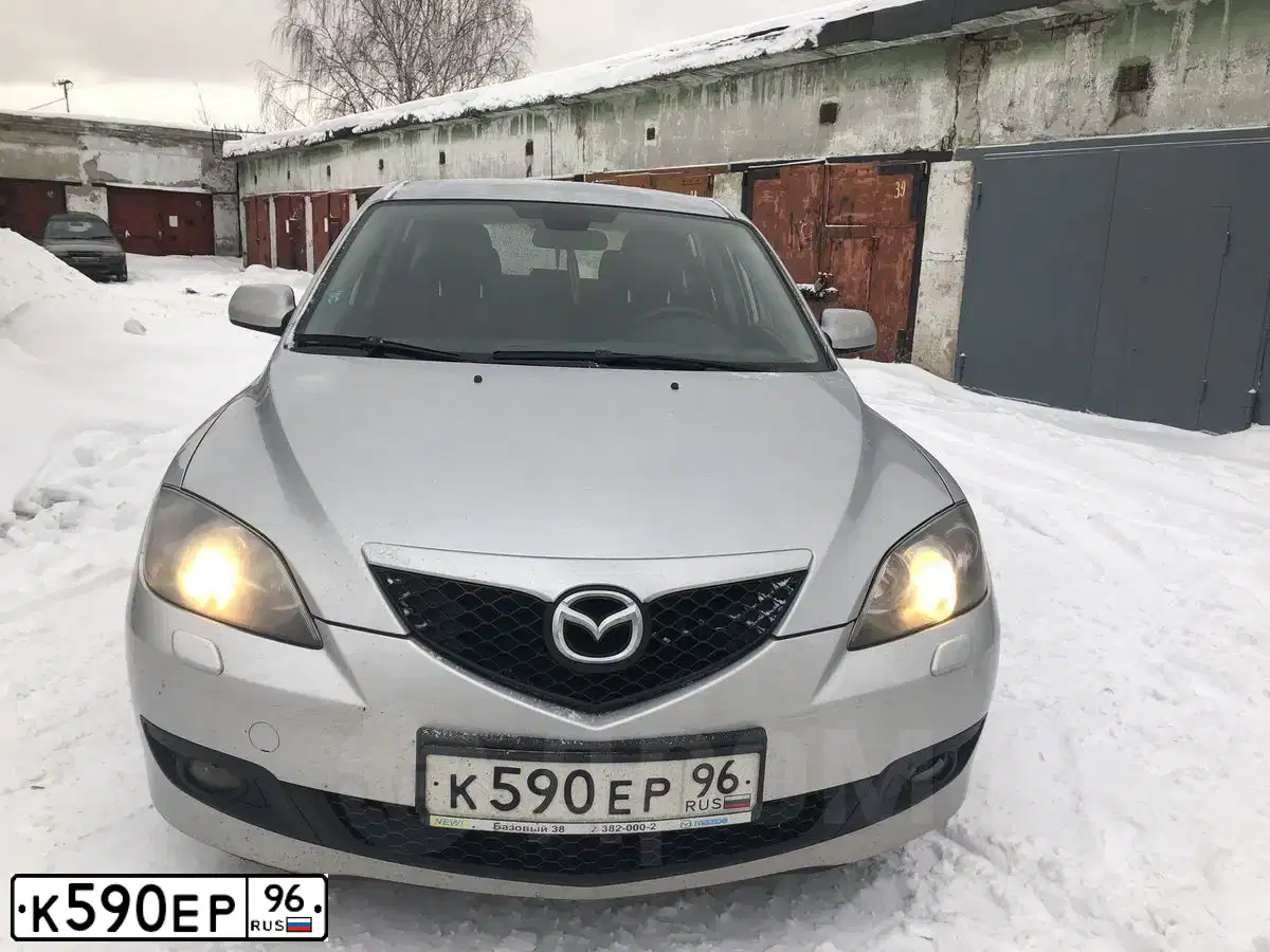 Фото автомобиля MAZDA 3, 2007 — госномер К590ЕР96. Цвет: СВЕТЛО-СЕРЫЙ