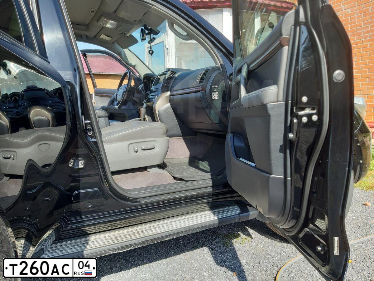 Фото автомобиля TOYOTA LANDCRUISER 200, 2009 — госномер Т148ТА196. Цвет: ЧЕРНЫЙ