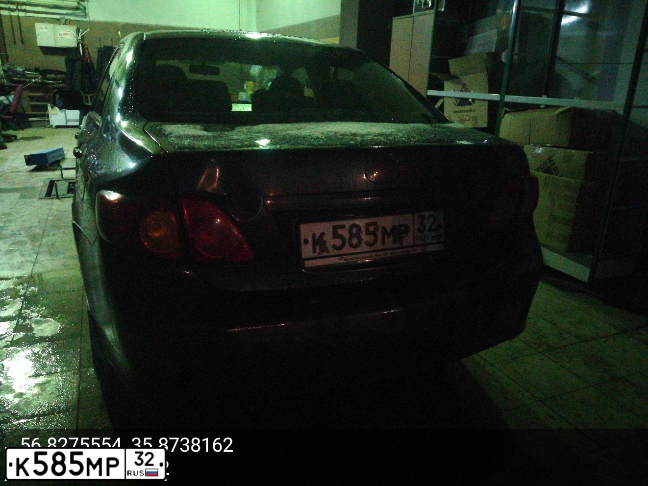 Фото автомобиля LADA 2112, 2003 — госномер К585МА32. Цвет: ТЕМНО-ЗЕЛЕНЫЙ