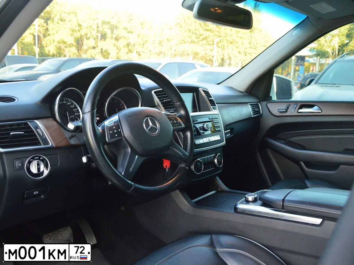 Фото автомобиля TOYOTA COROLLA, 2004 — госномер М001КМ72. Цвет: СЕРЕБРИСТЫЙ