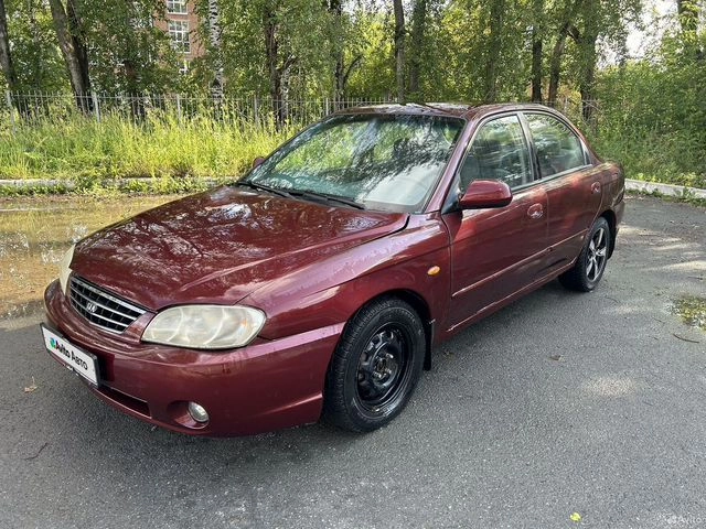 Фото автомобиля KIA SPECTRA, 2006 — госномер Т468ОТ196. Цвет: КРАСНЫЙ ПЕРЕЦ
