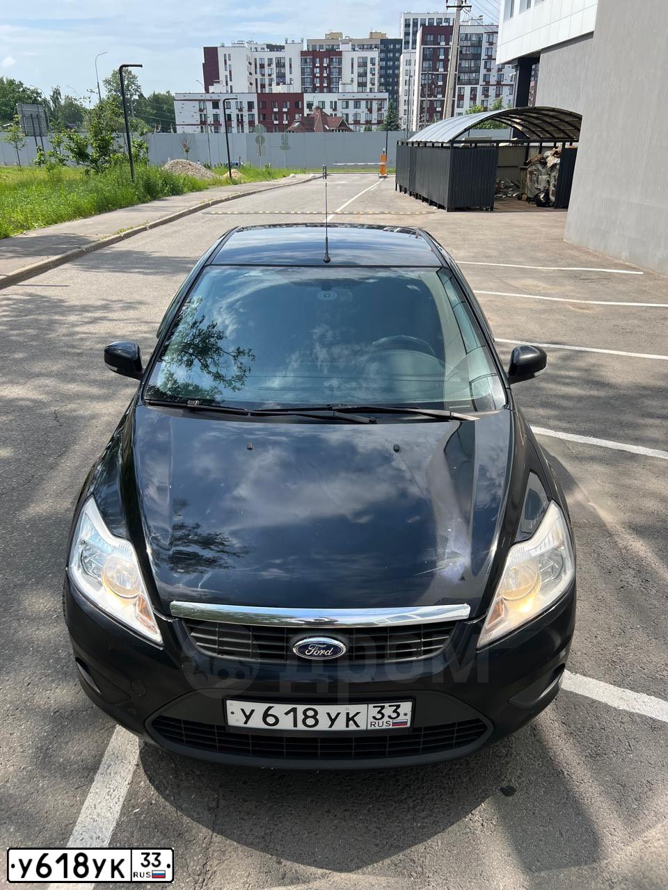 Фото автомобиля FORD FOCUS, 2009 — госномер Е327РЕ53. Цвет: ЧЕРНЫЙ