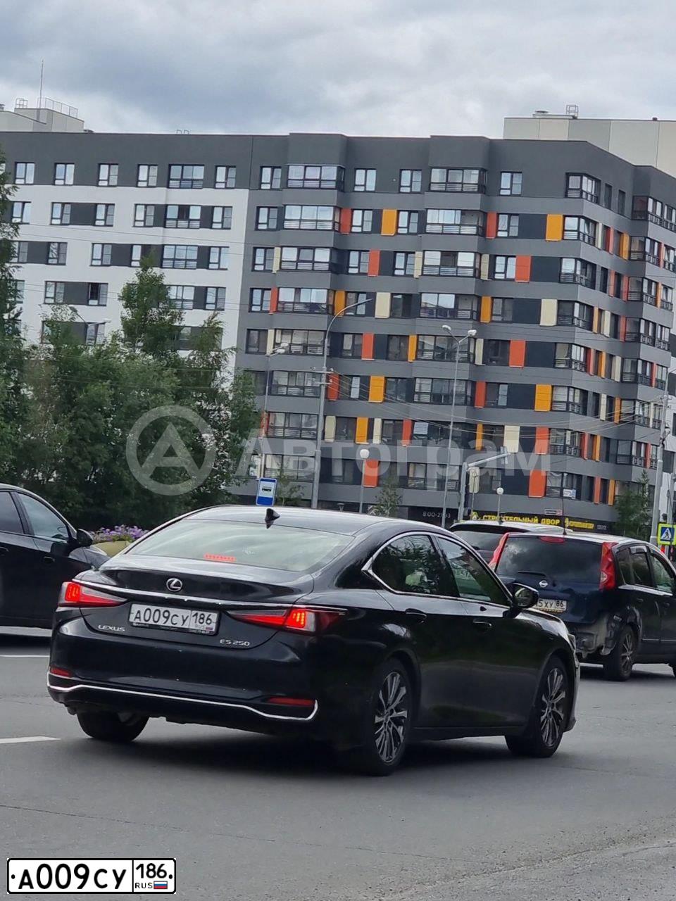 Фото автомобиля LEXUS ES, 2020 — госномер А009СУ186. Цвет: ЧЕРНЫЙ